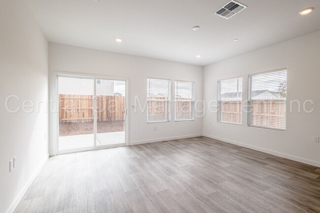 Photo - 4 Bedroom/2 Bath Home with Paid Solar in the Southwest - $2545 Per Month!