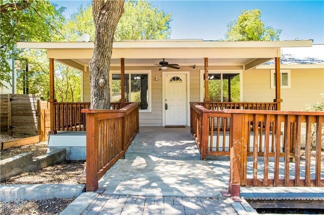 Photo - Stunning Renovation - New Hardwood flooring, tile in Kitchen. Granite countertops, breakfast bar