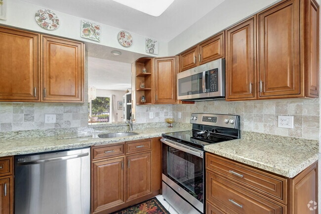 Building Photo - 7286 Huntington Ln Unit 306 Rental