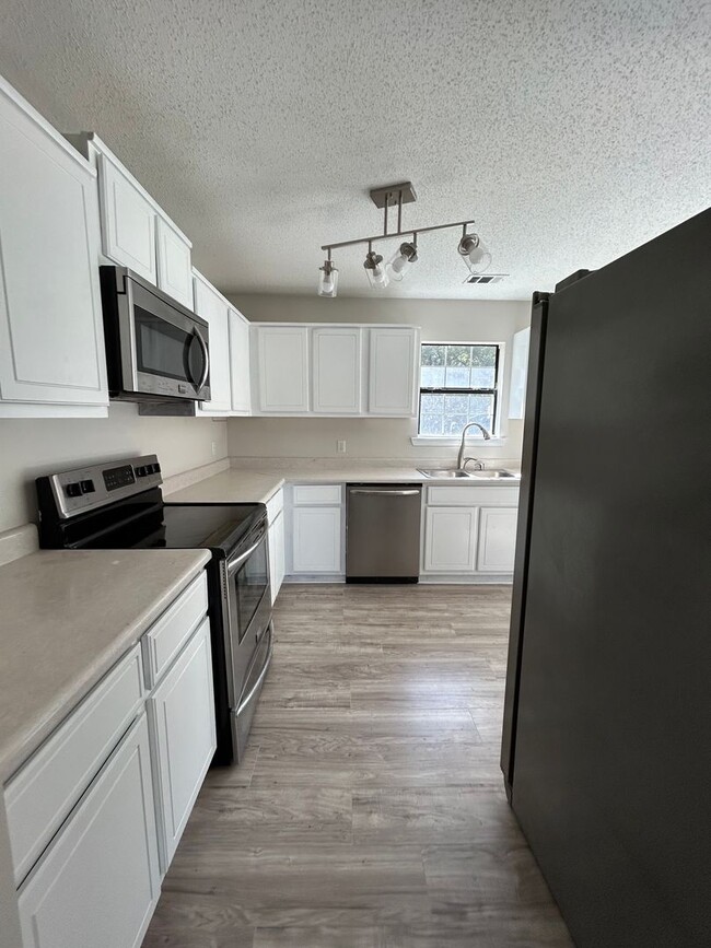 Photo - 3-Bedroom, 2-Bath Home on almost an 1 Acre – Pet-Friendly!