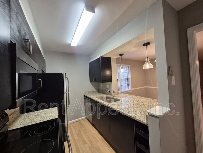 Photo - 204 Triumph Dr NW