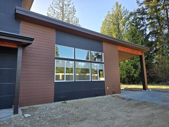 Front of Home with Huge picture windows to take in the view - 18507 9th St E House Unit #B