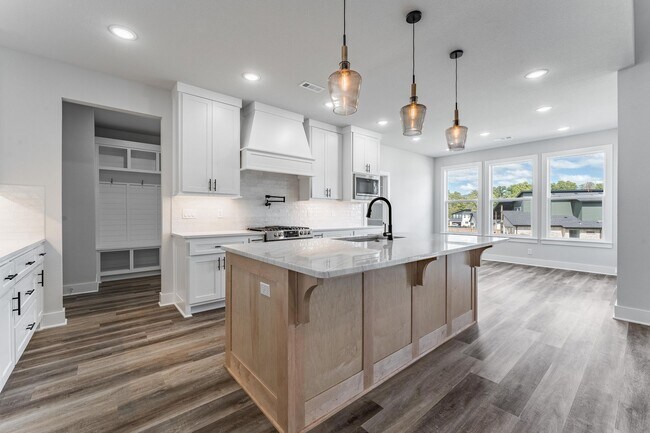 Photo - Modern Elegance: Spacious 4-Bedroom New Bu...
