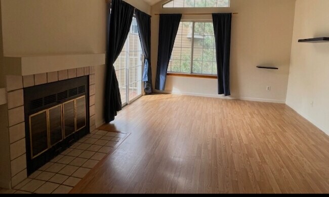 Spacious Sunny living room with wood fireplace - 6036 Gunbarrel Ave Unit 6036 Gunbarrel Ave