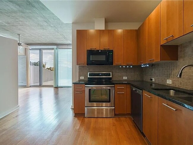 Photo - 1 bdrm, 1 bath condo with large private patio. Pool and gym on site!