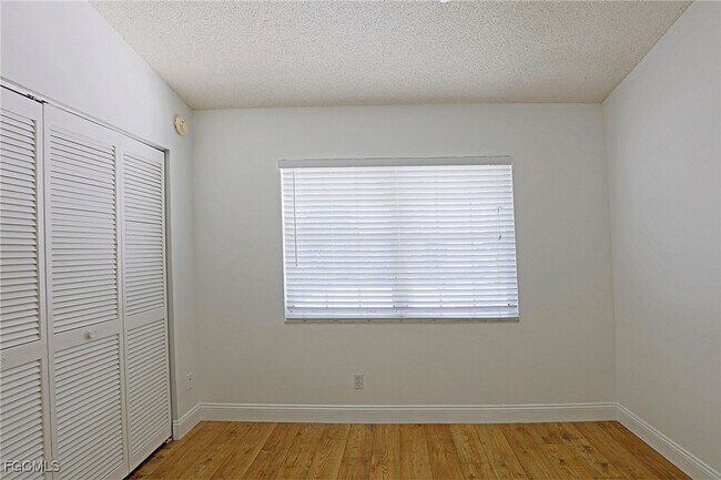 Building Photo - 14975 Rivers Edge Ct Unit 214