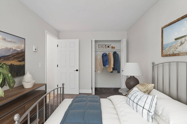 Welcome to Eagle Rock Apartments at Nashua, where modern comfort meets stylish living. This spacious bedroom offers a serene retreat with ample storage and contemporary design. Don’t miss your chance to elevate your lifestyle—schedule a tour today!