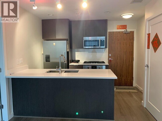 Photo - 3333 Sexsmith Rd Unité 6F