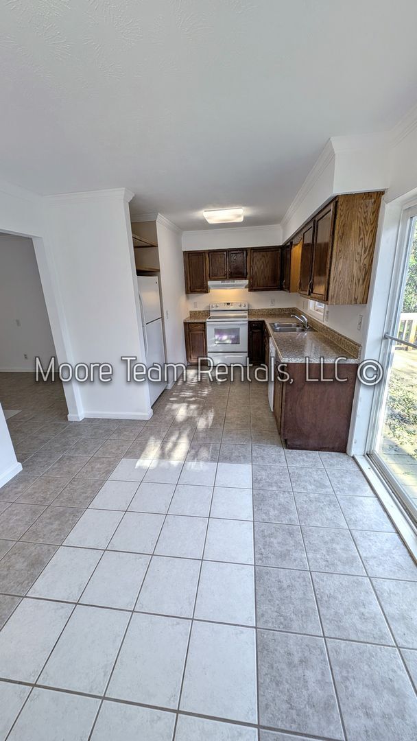 Photo - 3/2 Brick House, Deck, Storage & Fenced Yard