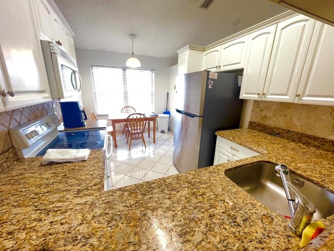 Photo - 4698 Lucerne Lakes Blvd E Unit 203