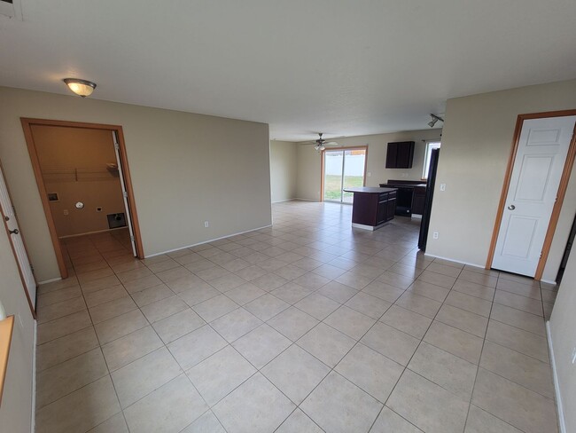 Photo - Comfortable 4-Bedroom Home with Fenced Bac...