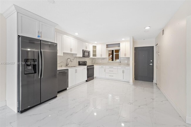 Building Photo - 7920 Camino Real Unit M-109