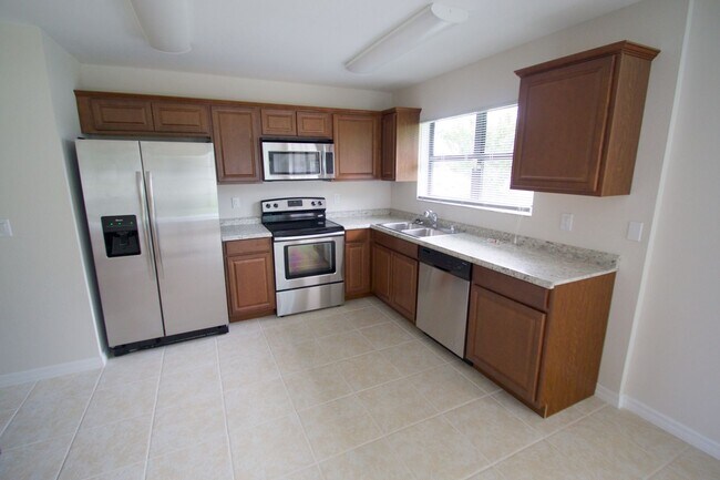 Photo - Waterfront 3BR Home on Canal | Spacious Yard | Lawn Care Included | Pet Friendly