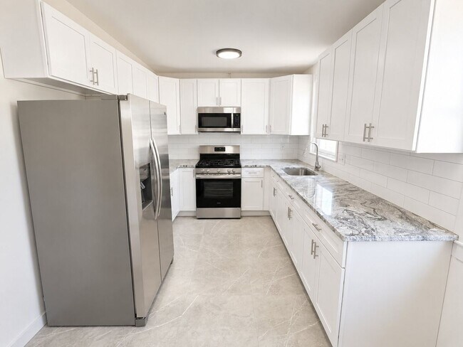 Photo - Spacious 3BR Home with Finished Basement, Garage & Driveway in Rhawnhurst