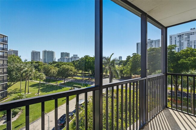 Building Photo - 3401 N Country Club Dr Unit 519