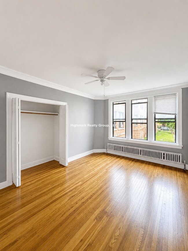 Building Photo - 1365 W Estes Ave Unit 1O