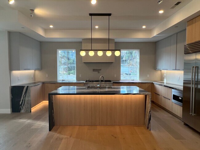 Photo - Stunning new build, top of the line everything, walk to town location, close to schools! INCLUDES...