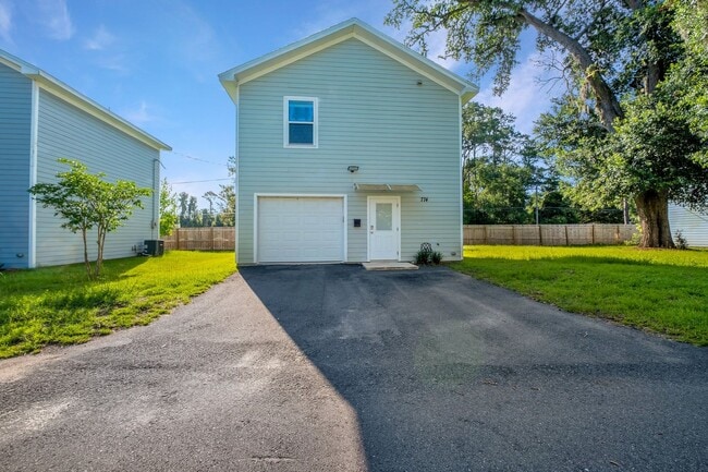 Photo - Modern Comfort Meets Prime Location — Stylish 2-Story Townhome