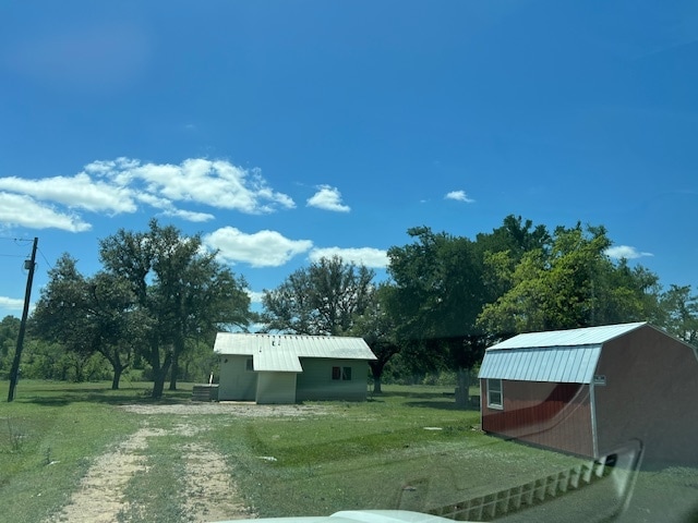 View of house from entrance. The red barn is no longer there. - 4906 Round Mt - Sandy Rd