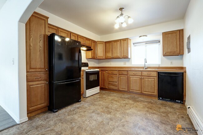 Kitchen - 5401 E 38th Ct Apartments Unit #4