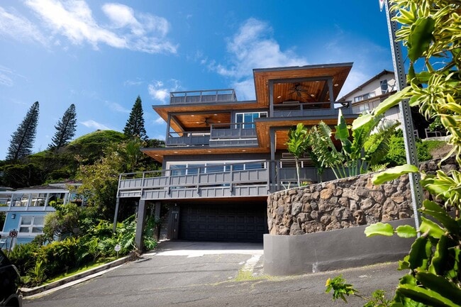 Building Photo - Fully Furnished Executive Retreat with Iconic Views - Stunning Sunrises - Elevated Island Living