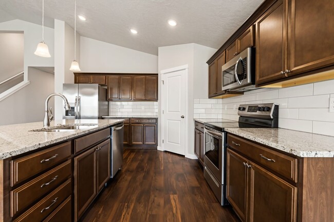 Photo - 4 Bedroom, 2 Bath + Bonus Room Home on a L...