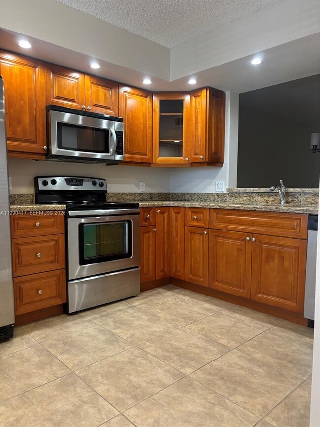 Building Photo - 1650 SW 124th Terrace Unit 303D