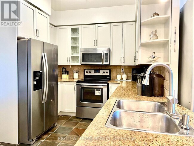 Photo - 28 William Carson Crescent Unit PH 23