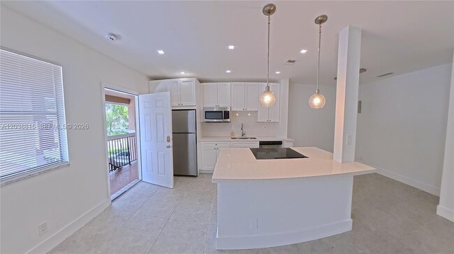 Building Photo - 11576 NW 42nd St Unit 11576