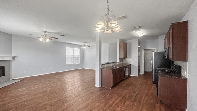 Photo - 3 Bed, 2 Bath Home with Garage & Fenced Yard / Pet-Friendly / Available now!