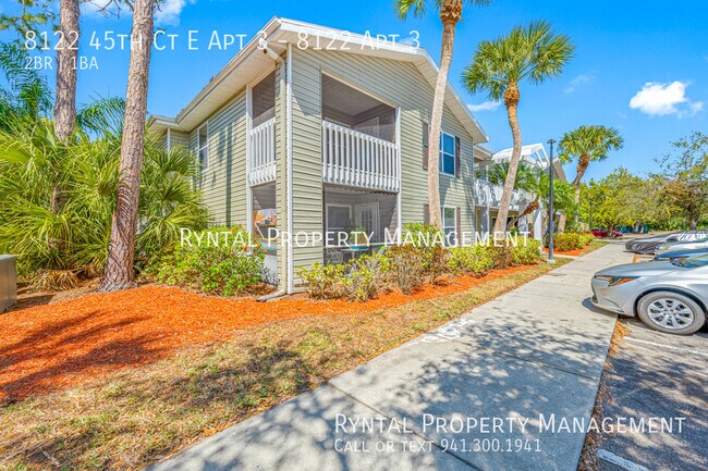 Building Photo - 8122 45th Ct E Unit 8122 Apt 3