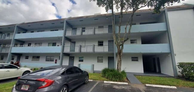 Building Photo - 8331 Sands Point Blvd Unit C205