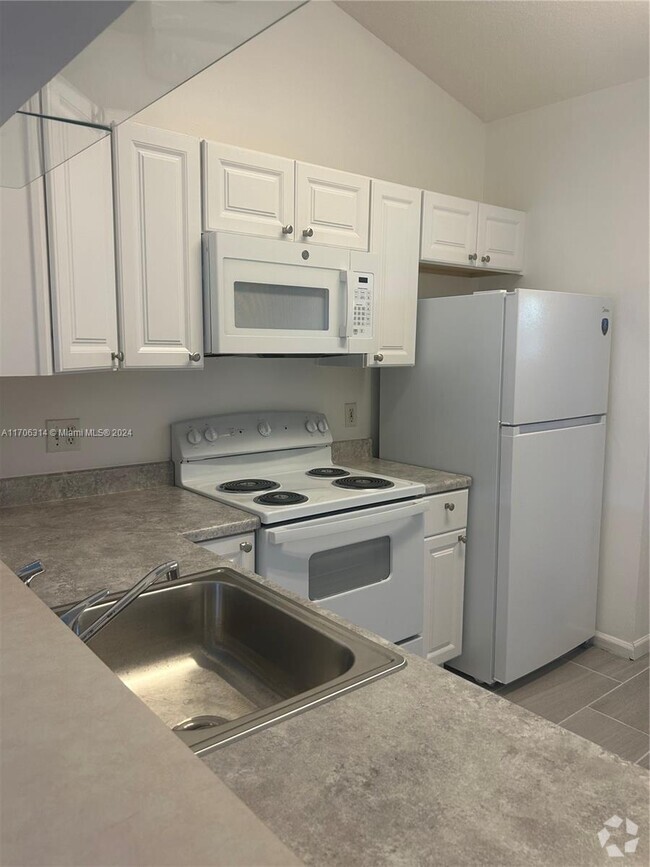 Building Photo - 2451 NW 56th Ave Unit 1-205 Rental