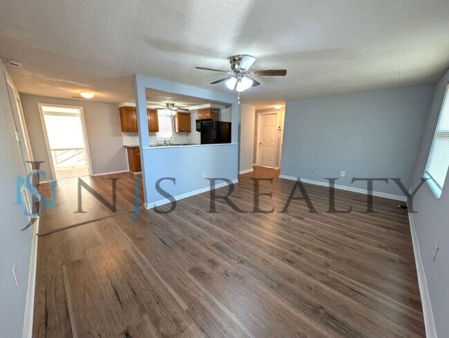 Photo - Fabulous 3/1/1 980 Sq. Ft. with NEW AC, NEW flooring, UPDATED kitchen & bath with GRANITE counter...