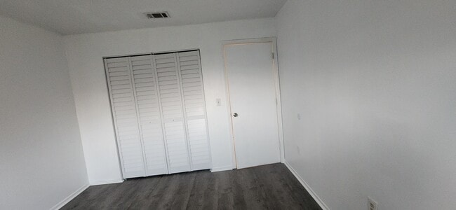 New doors for closet in bedroom 1 - 1552 University Ln Unit 206