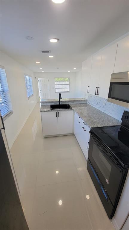 Photo - 831 NW 14th Way Unit 1-2