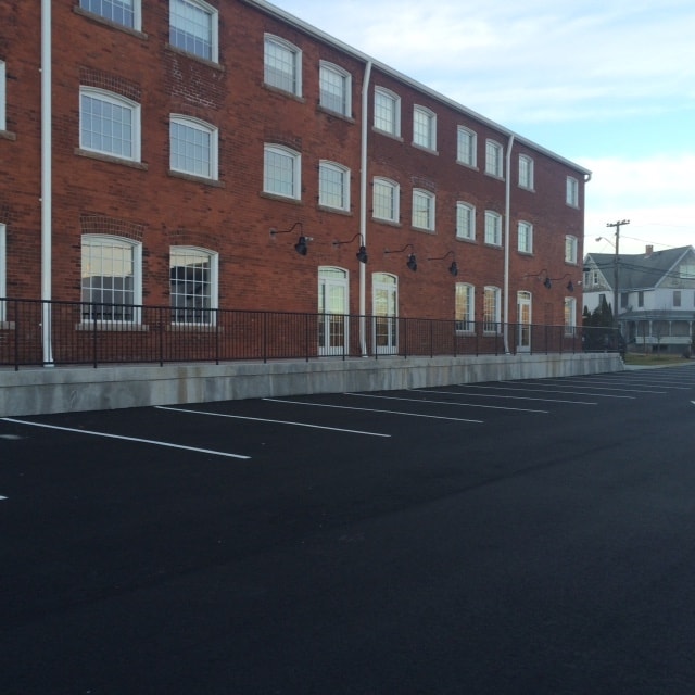 Main entry to retail space - Threadmill Apartments