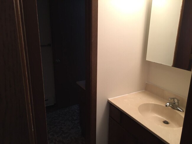 Photo - 2 BR 1BA Walkout Patio Garage Included Unit WW-6