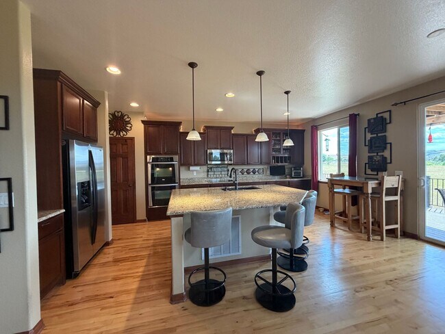 Photo - Luxury Furnished Executive Home with Entertainers Basement, Trex Deck & 3-Car Garage