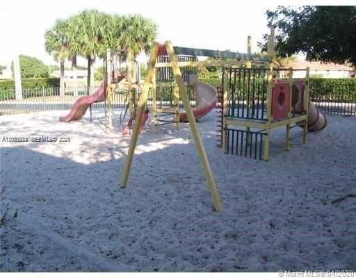 Photo - 8871 Wiles Rd Unit 301