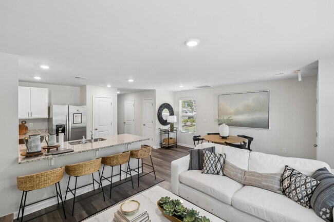 Pearson - Model - 3BR, 2.5BA - 1,418SF - Living Room - The Townes at Amber Bluff