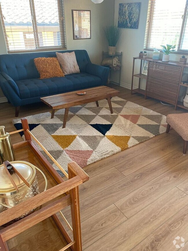 Building Photo - Charming Fully Furnished 2-Bedroom Unit in... Rental