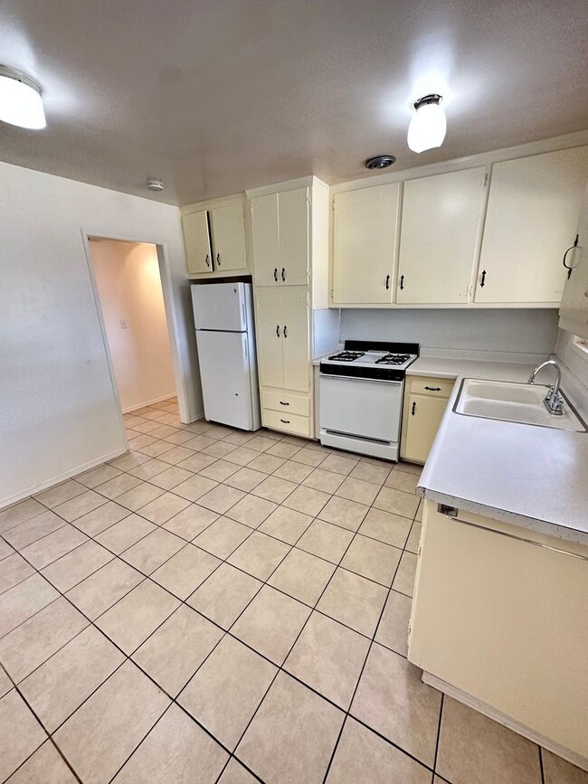 Photo - Beautiful House 3RB/1BA Single Family Home with 2 Car Garage & Large Fenced Backyard.