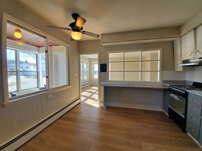 Kitchen view into large living room - 12 Villa St