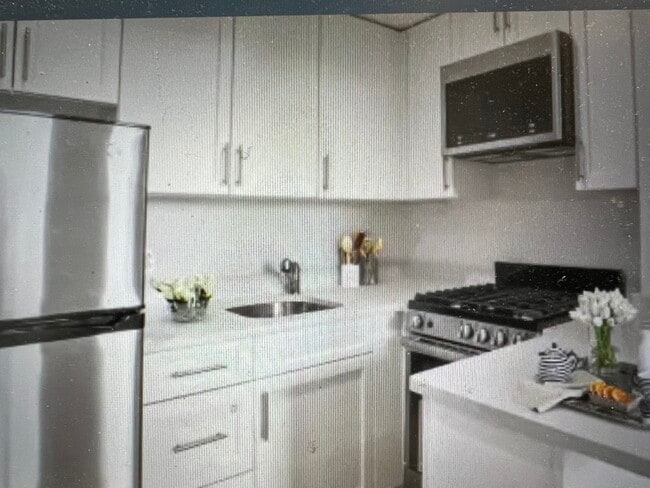 Building Photo - 65 Burbank St Unit 404