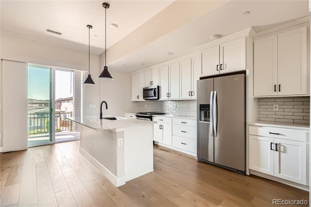 Photo - 1565 W 67th Ave