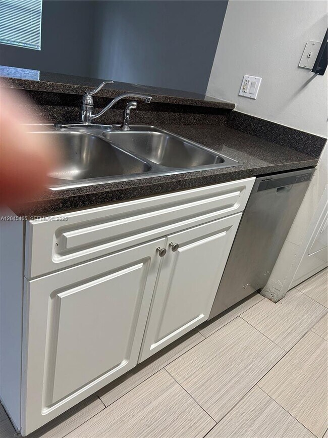 1267 SW 46th Ave Unit Royal Poinciana