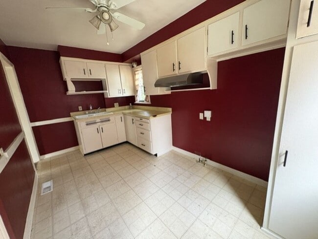 Photo - Charming 2-Bedroom Brick Home with Central Air, Garage & Spacious Backyard