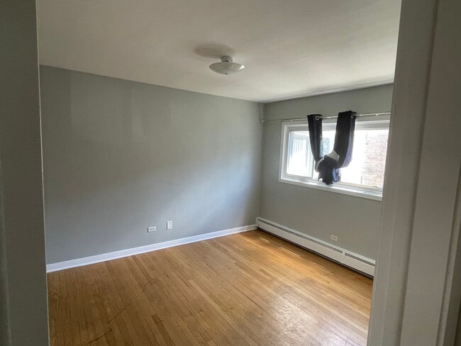 Building Photo - 8845 Lamon Ave Unit 2W