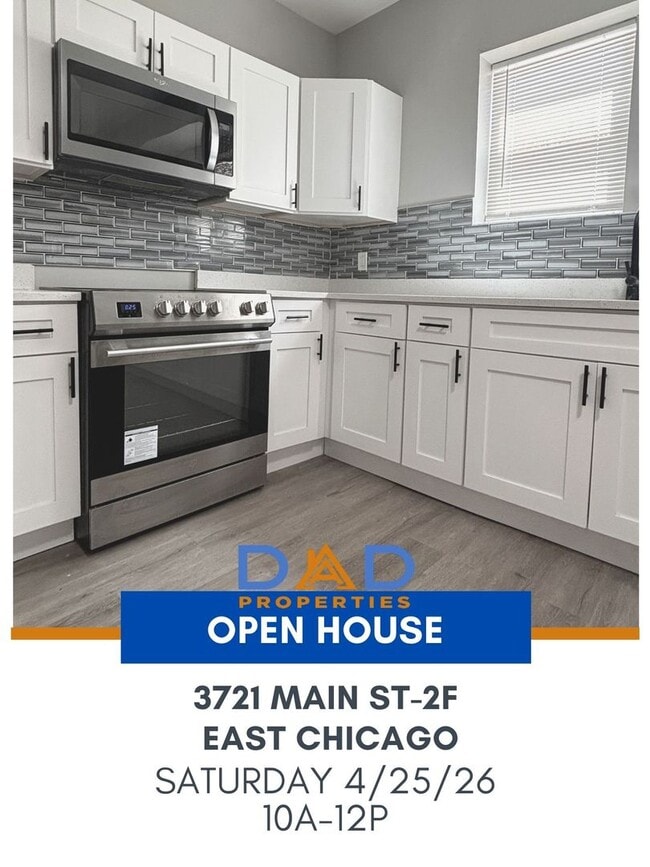 Building Photo - 3721 Main St Unit 2 Front